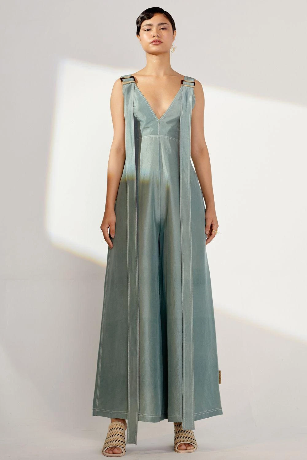 Twinkle Hanspal Teal Silk Jumpsuit With Exaggerated Belts